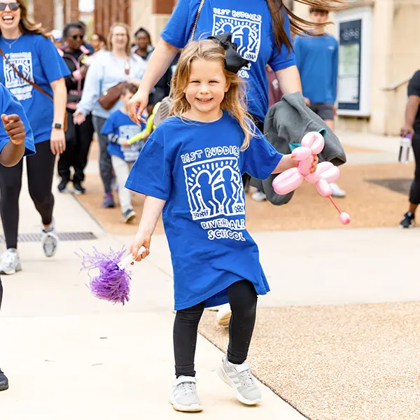 Young girl smiling at the event