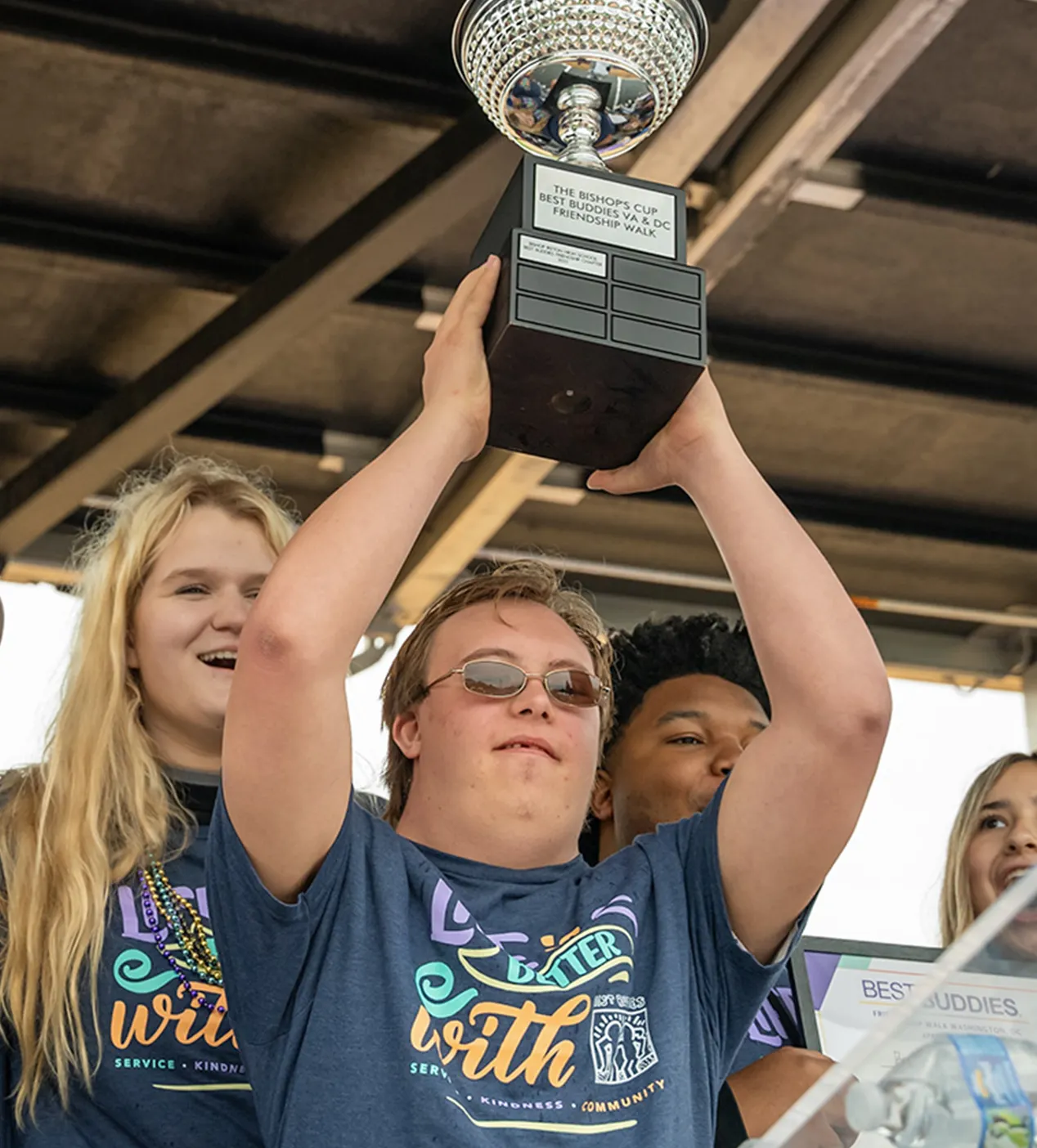 Top event fundraiser holding trophy